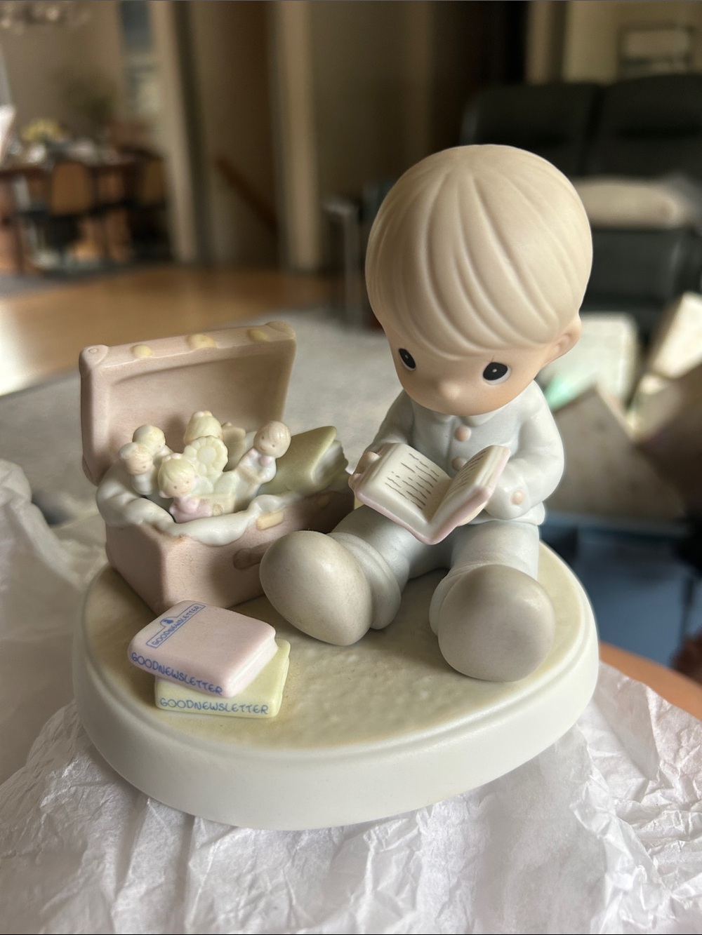Precious Moments Ivory and Pink Boy Figurine Reading by Toy Chest
